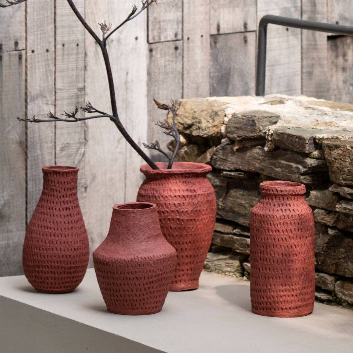 Red cotton mache bottle vase